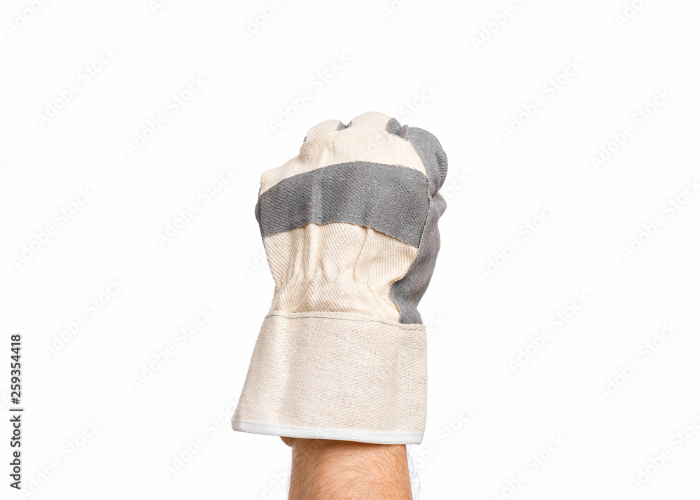 Worker showing gesture - fist. Male hand wearing working glove, isolated on white background. Worker showing gesture - fist. Male hand wearing working glove, isolated on white background.