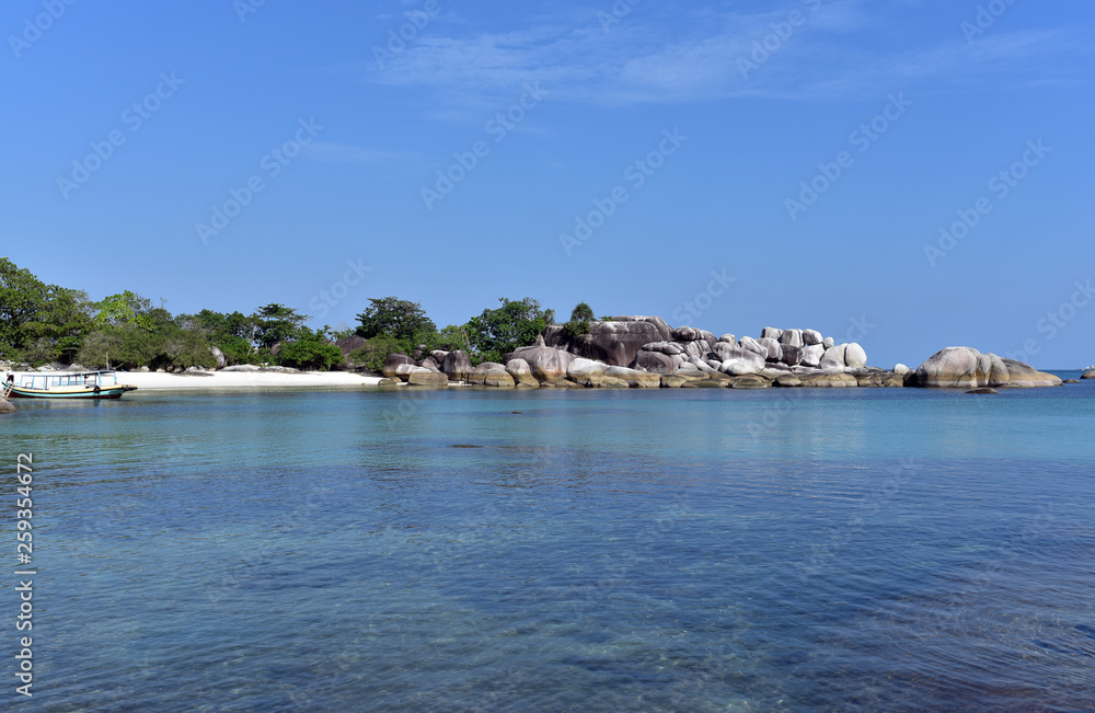 Tanjung Tinggi Beach on a sunny day in Belitung Island, Indonesia