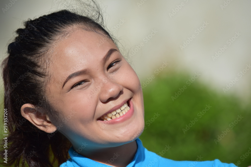 Youthful Asian Female Smiling