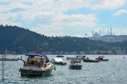 Small motoboats on the Bosphorus on a clear summer day. Istanbul, Turkey