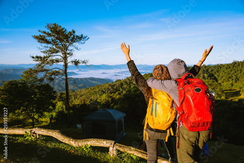 Young couple Camping Hiking Journey Travel Trek Concept, Holiday travel, Travel relax, Natural Touch countryside, in Thailand.