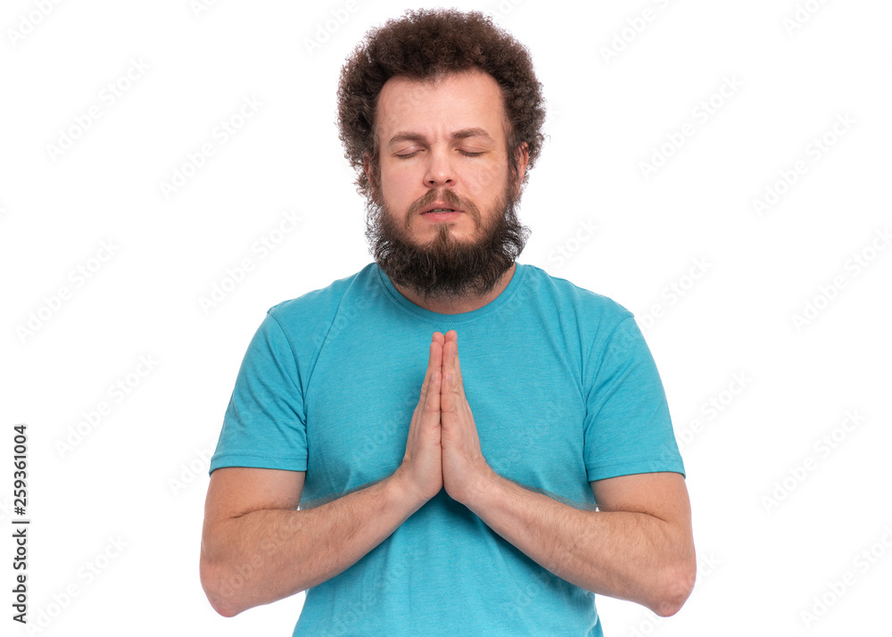 Portrait of caucasian crazy bearded Man with funny Curly Hair - saying prayers, isolated on white background. Religious image - Guy praying and praising God. Portrait of caucasian crazy bearded Man with funny Curly Hair - saying prayers, isolated on white background. Religious image - Guy praying and praising God.