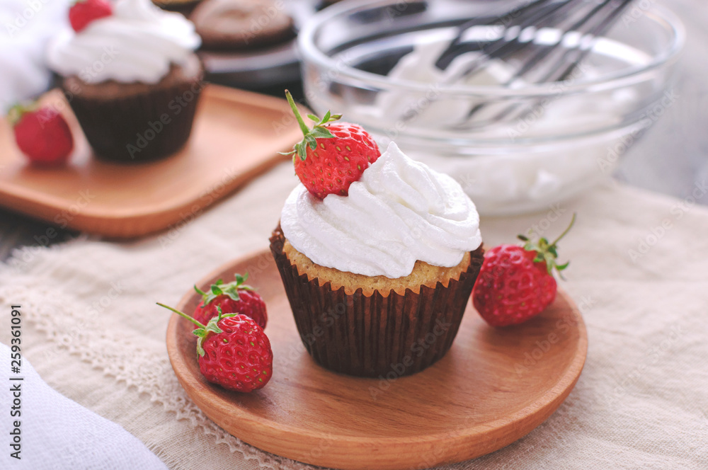 Cupcake with protein cream and strawberries. Cupcake with protein cream and strawberries.