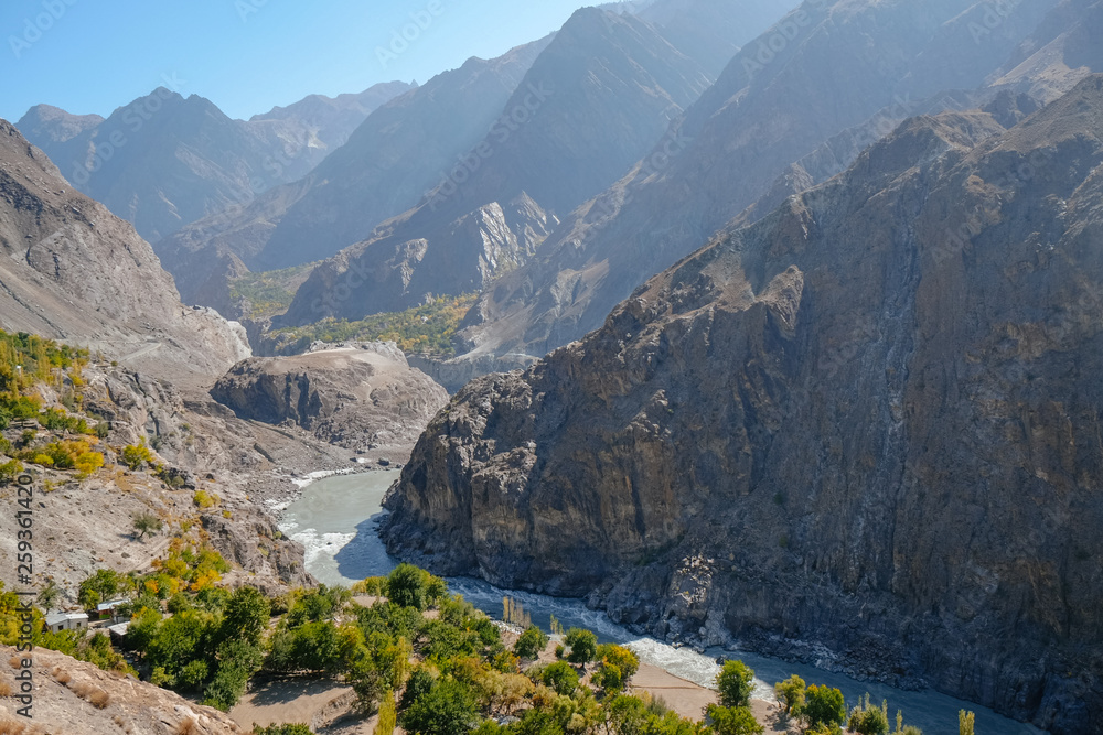 Indus river flowing through mountains along the Karakoram highway. Gilgit Baltistan, Pakistan.