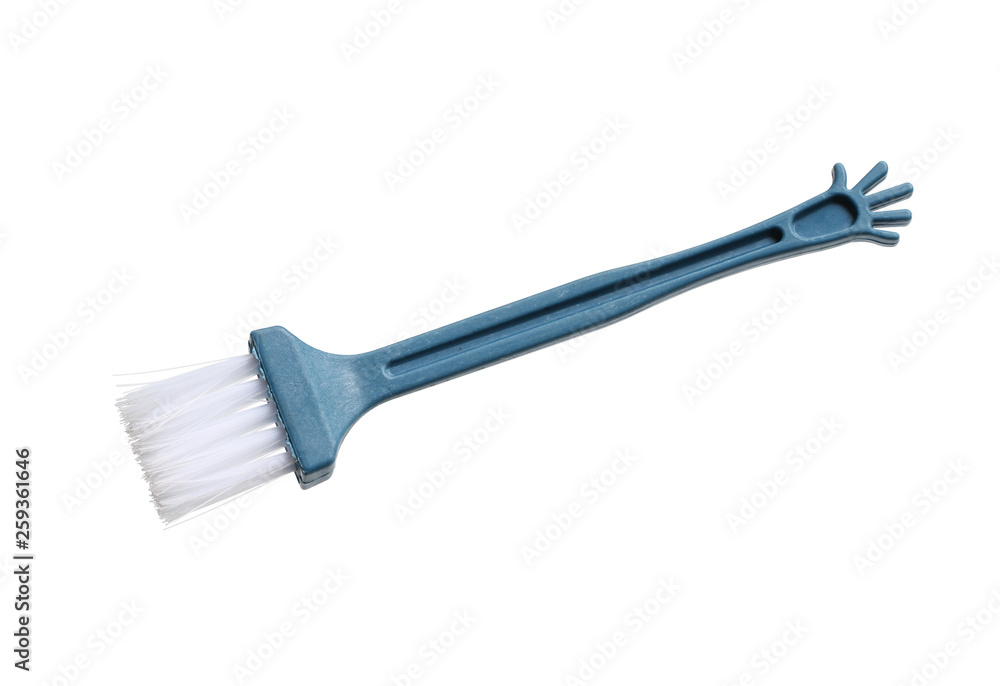 Plastic brush for cleaning computer keyboard isolated on white background Plastic brush for cleaning computer keyboard isolated on white background