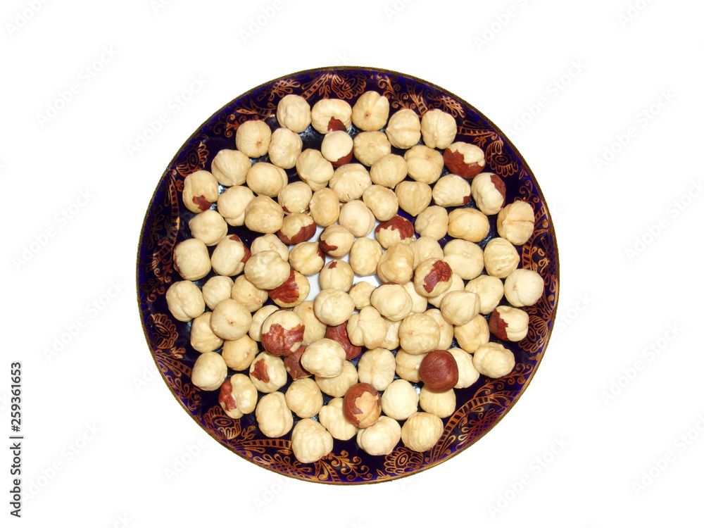 hazelnut peeled on a plate hazelnut peeled on a plate