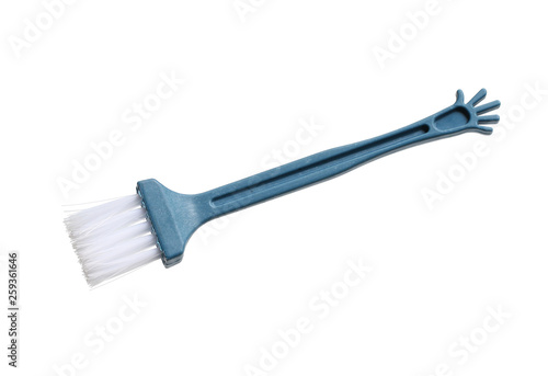 Plastic brush for cleaning computer keyboard isolated on white background
