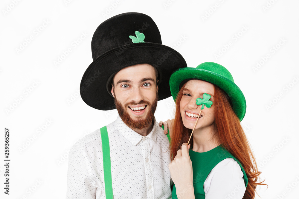 Happy young couple wearing costumes, celebrating Happy young couple wearing costumes, celebrating