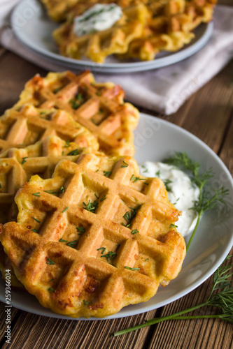cheese waffles with corn flour, herbs and sauce