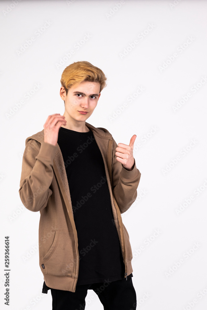 handsome young man posing on white background handsome young man posing on white background