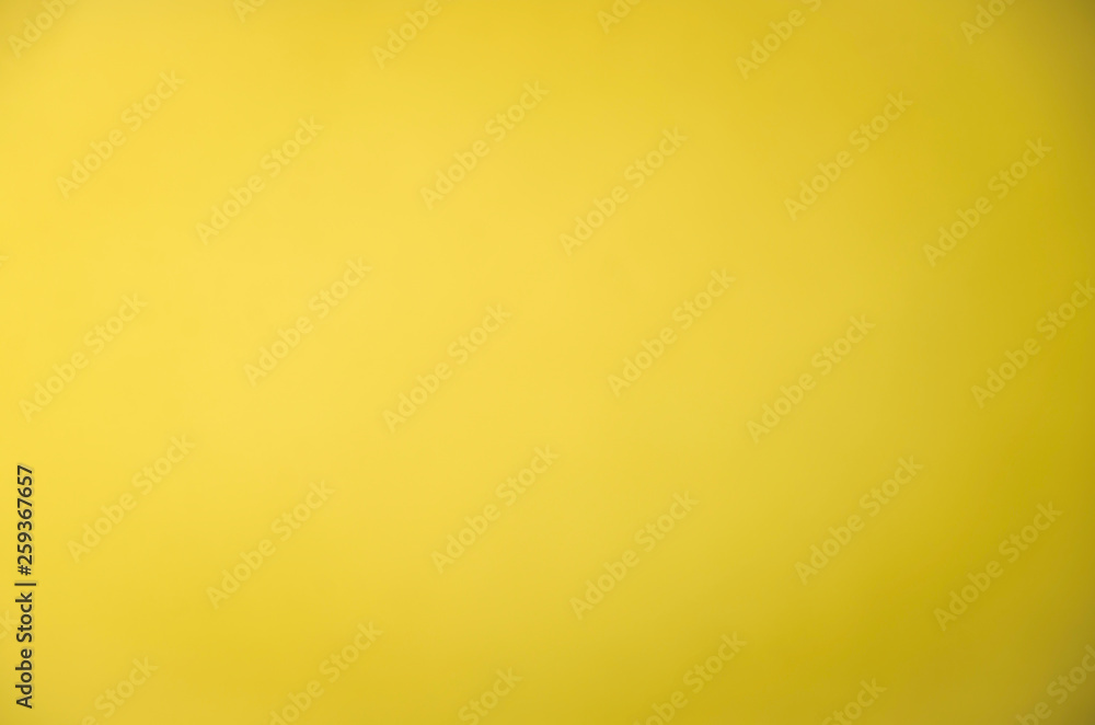 Abstract blurred background in yellow color. Gradient. Abstract blurred background in yellow color. Gradient.