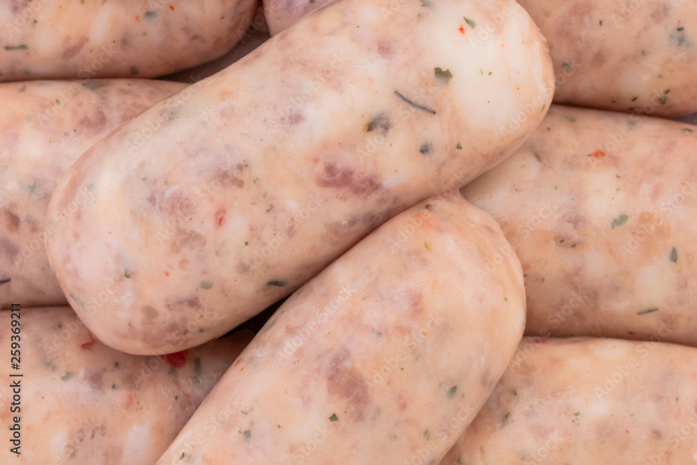 Raw pork sausages texture background, top view Raw pork sausages texture background, top view