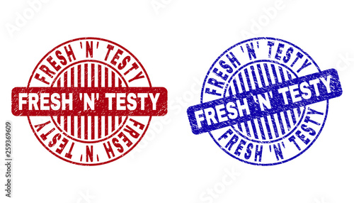 Grunge FRESH  N  TESTY round stamp seals isolated on a white background. Round seals with grunge texture in red and blue colors.
