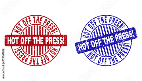 Grunge HOT OFF THE PRESS Exclamation round stamp seals isolated on a white background. Round seals with grunge texture in red and blue colors.