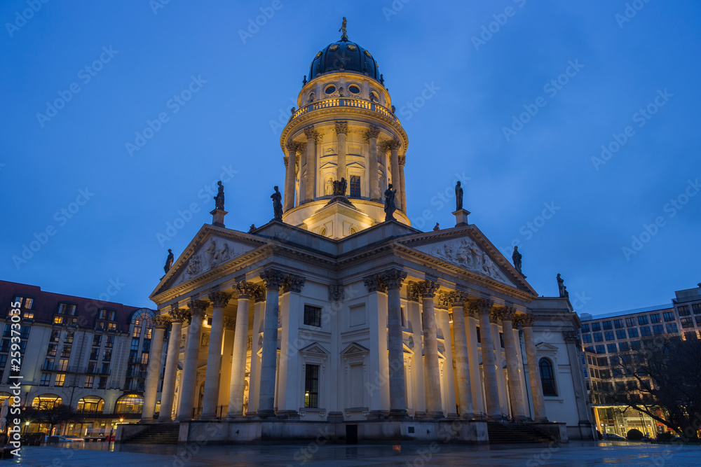 Illuminated Neue Kirche (Deutscher Dom, German Church or German Cathedral) in Berlin, Germany, at the Gendarmenmarkt Square in Berlin, Germany, in the evening.