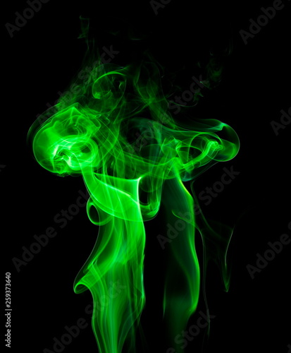 Fototapeta Naklejka Na Ścianę i Meble -  Green smoke on black background