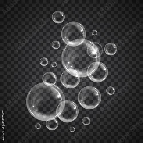 Realistic floating soap bubbles on transparent background. Design element for advertising booklet, flyer or poster