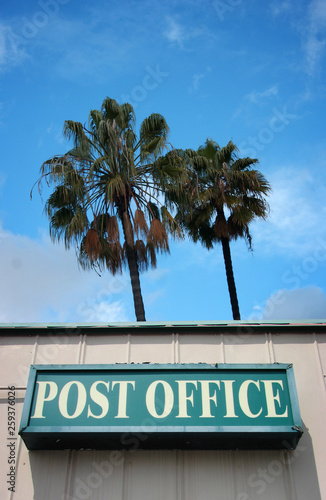 post office sign with palm trees