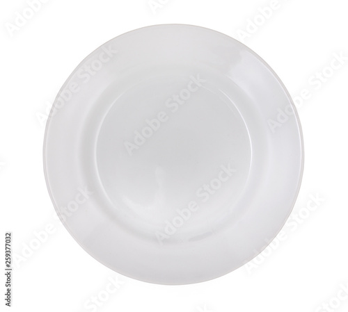 Empty white plate isolated on a white background. Close up, top view.