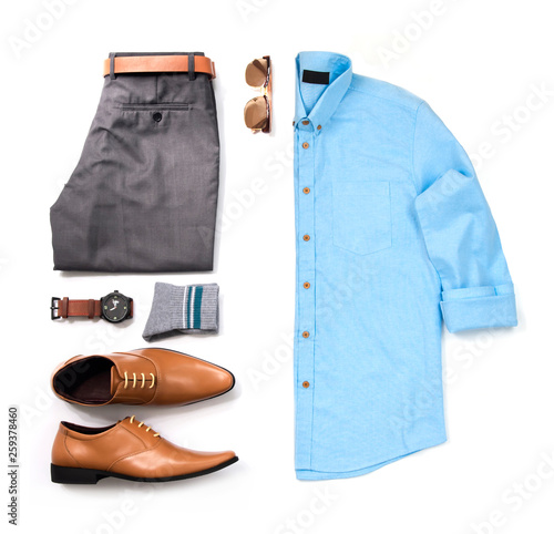 Men's casual outfits for man clothing with blue shirt , watch, sunglasses, trousers, socks and office shoes isolated on white background, Top view. pack shot