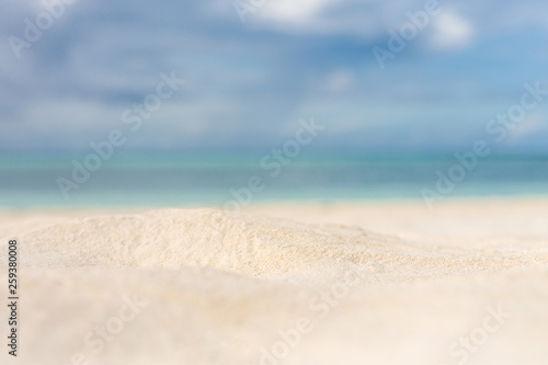 White sand background and decoration of sea sky and sun