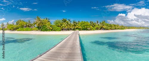 Fototapeta Naklejka Na Ścianę i Meble -  Beautiful tropical Maldives island with beach and wooden jetty. Maldives beach panorama, luxury resort and exotic vacation or holiday concept