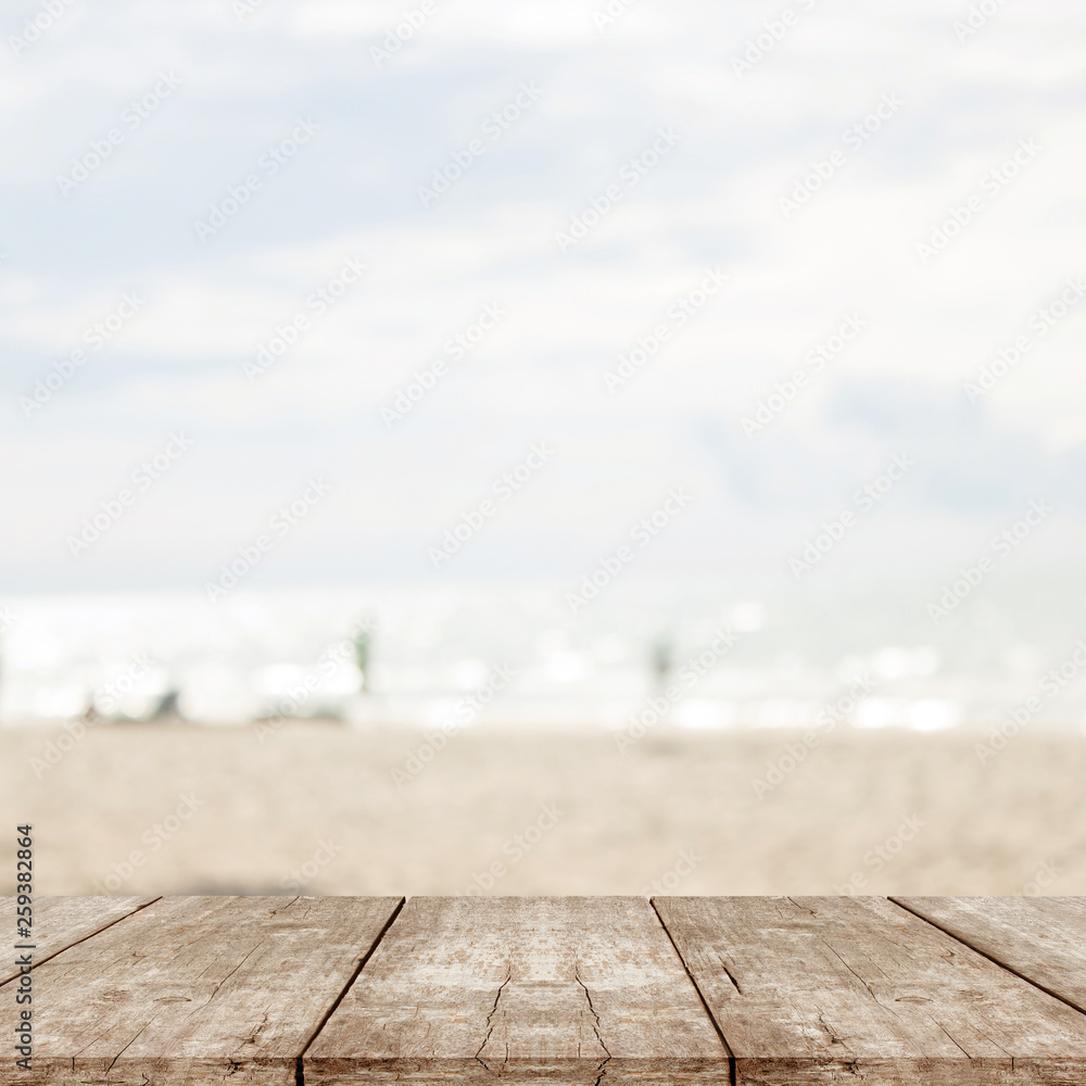 empty wood table on blurred of sea beach empty wood table on blurred of sea beach