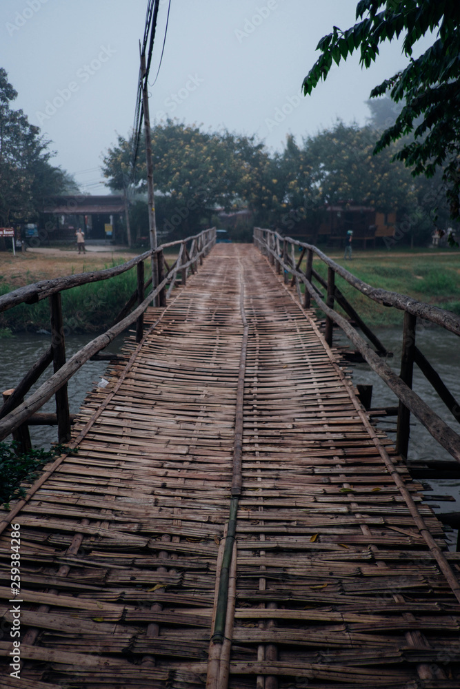 Fototapeta premium The bamboo bridge across Pai River, Mae Hong Son, Thailand