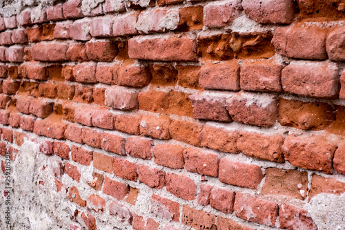 old wall of red bricks