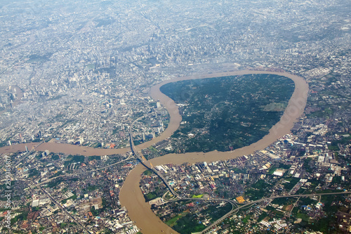 Aerial view of Bang Krachao , the green area or lung of Bangkok city, Concept for city development and planning or economic growth. Thailand tourism real estate and travel.