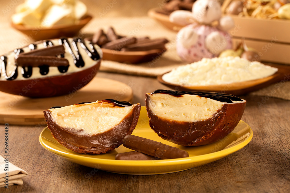 Gourmet easter egg, stuffed with cream and chocolate. Easter egg with pudding cream, Easter dessert. Easter concept.