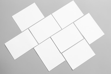 Blank portrait mock-up paper. brochure magazine isolated on gray, changeable background / white paper isolated on gray