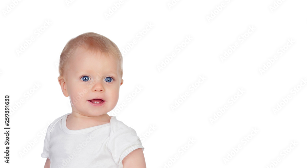 Small baby with a blue eyes and blond hair standing Small baby with a blue eyes and blond hair standing