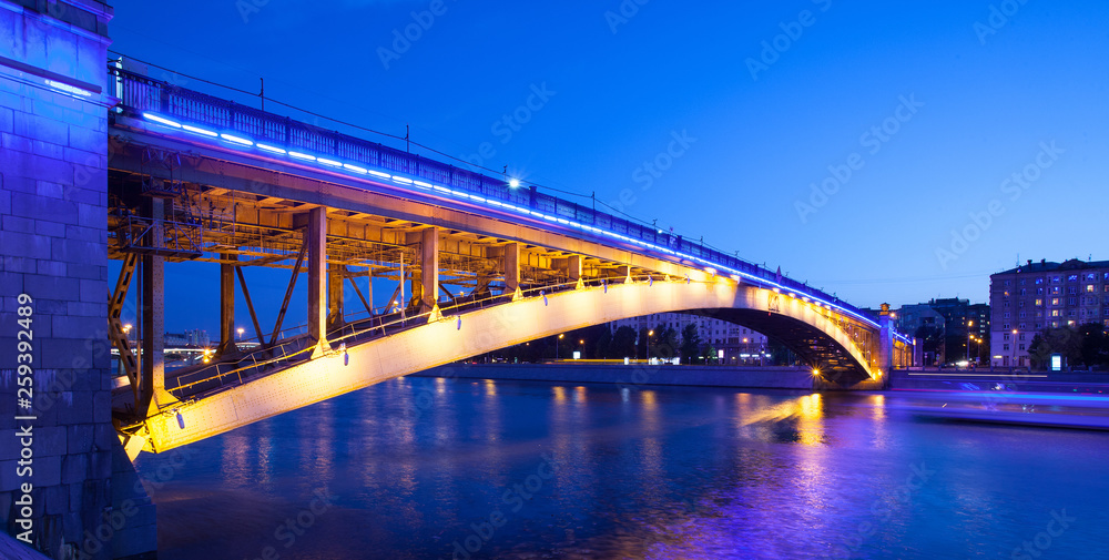 Obraz premium summer evening cityscape with Smolensky Metro Bridge