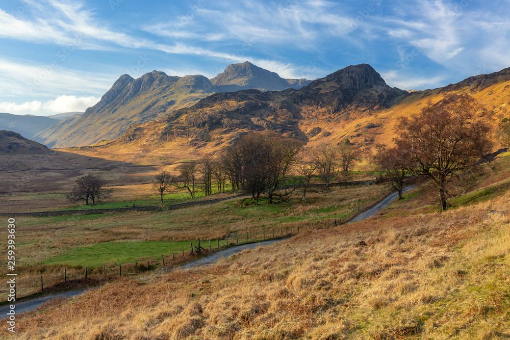 Blea Tarn is one of the easiest to visit, with a convenient car park on the Little Langdale to Great Langdale road. It has a backdrop of the Langdale Pikes, being at the very heart of wild Lakeland. 