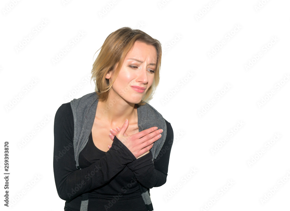Young blonde woman having a pain in the heart, isolated on a wh Young blonde woman having a pain in the heart, isolated on a wh