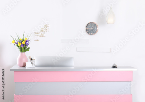 Modern reception desk in beauty salon. Stylish interior © New Africa