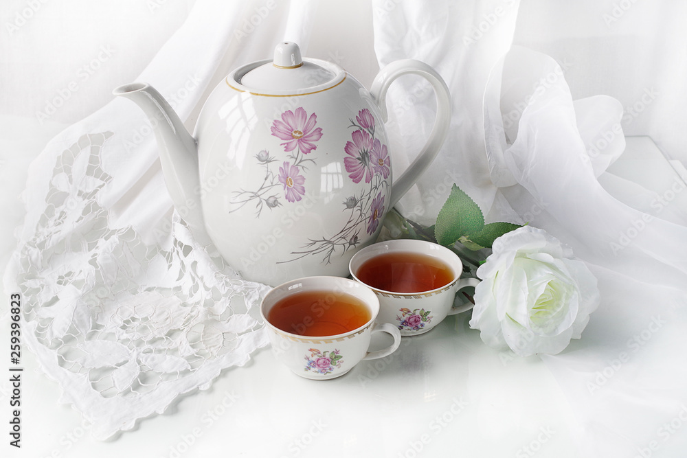 Cup of tea, tea, candy, isolated with white napkin