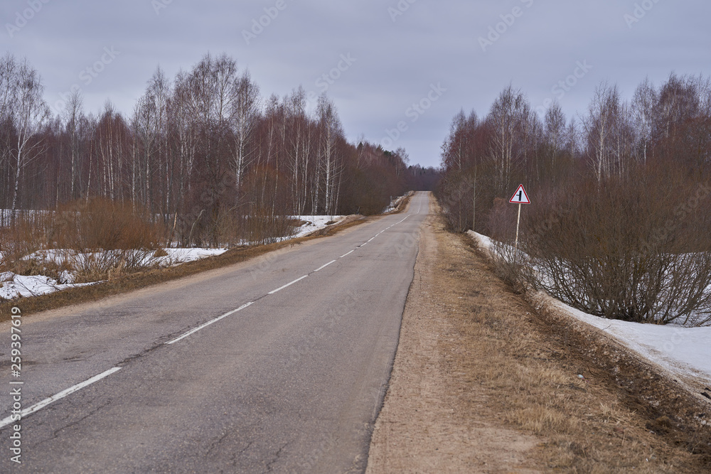 The road with asphalt coating and line markings The road with asphalt coating and line markings