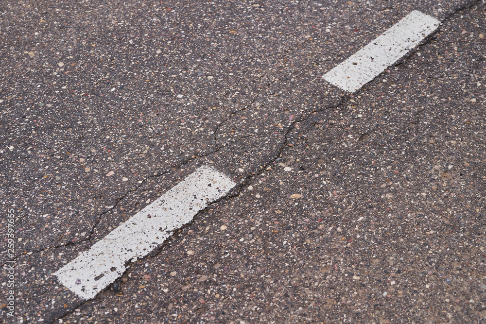 Fototapeta premium The road with asphalt coating and line markings