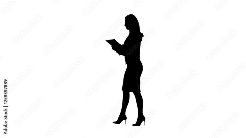 Business woman go and writes them down on paper. White background. Side view. Silhouette. Slow motion Business woman go and writes them down on paper. White background. Side view. Silhouette. Slow motion