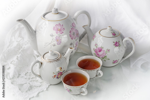 Cup of tea, tea, candy, isolated with white napkin