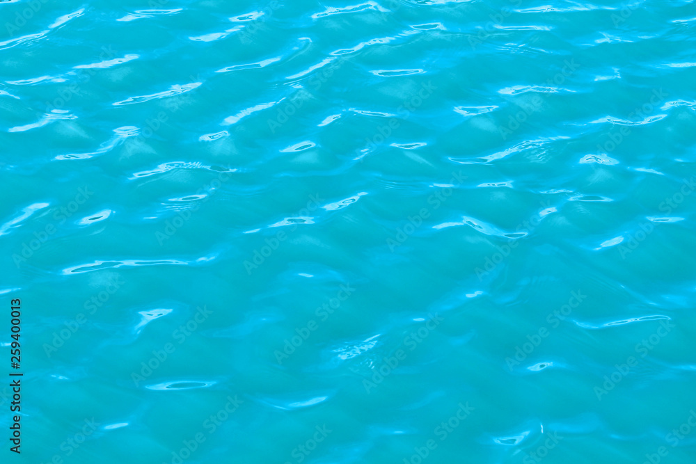 Abstract background with turquoise water surface Abstract background with turquoise water surface
