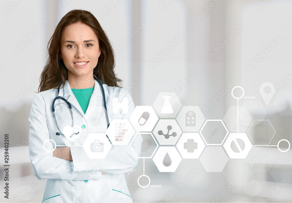 Young beautiful nurse on blurred hospital background Young beautiful nurse on blurred hospital background