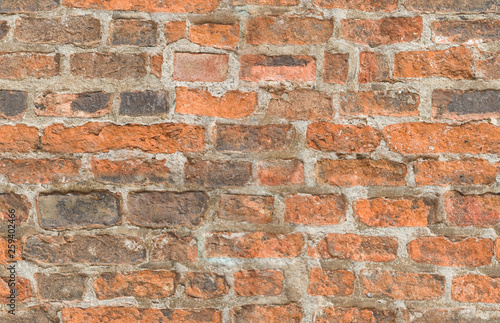 Seamless background of wall of orange brick. Design concept. Seamless pattern