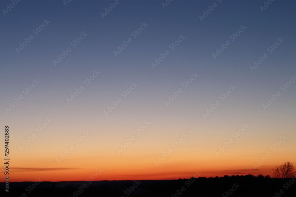 sun at sunset spring blue evening sky sun at sunset spring blue evening sky