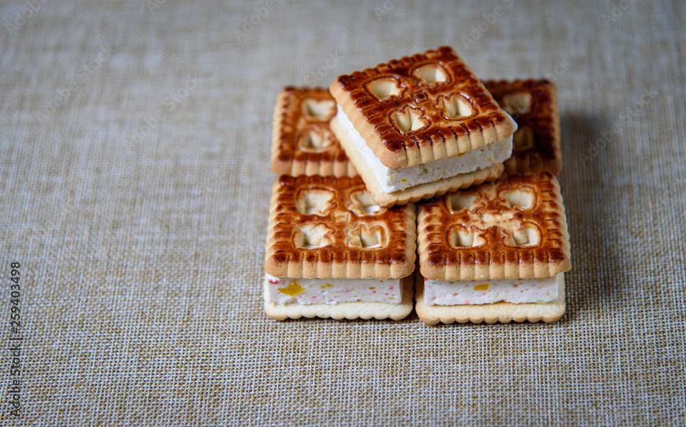 Cookies with marshmallows and marmalade on a wooden table. Fresh homemade pastries. Cookies with marshmallows and marmalade on a wooden table. Fresh homemade pastries.
