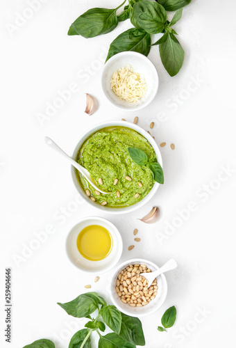 Pesto sauce with ingredients, overhead view