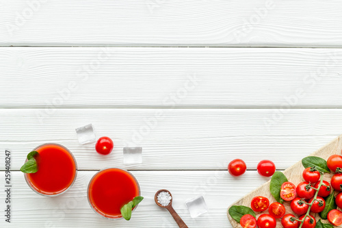 tomato juice for summer healthy drink on white background top view copyspace