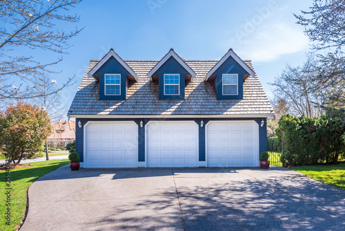 Fragment of a luxury house with a garage door in Vancouver, Canada. Horizontal orientation.